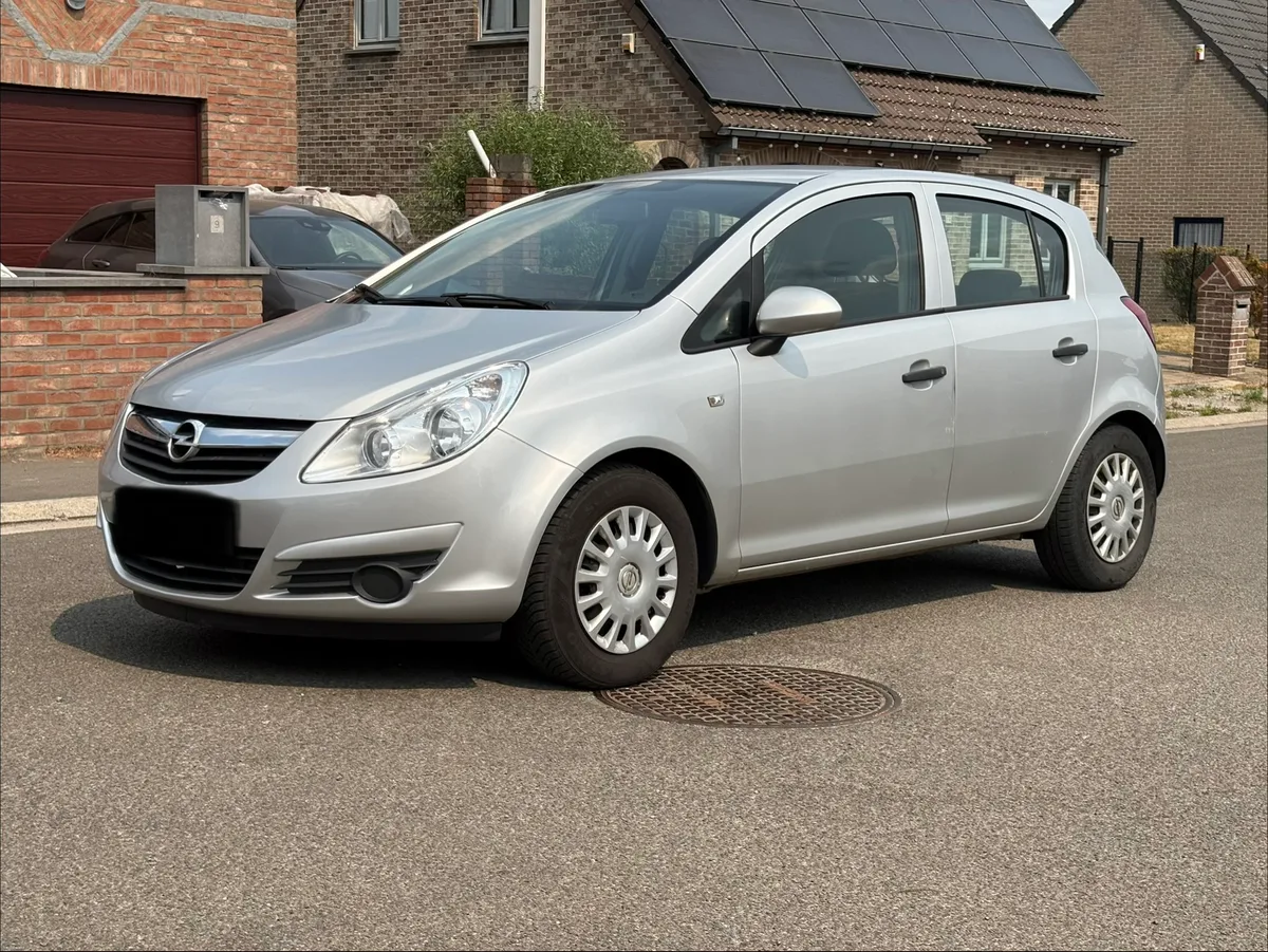 Opel Corsa 2010 — photo 3