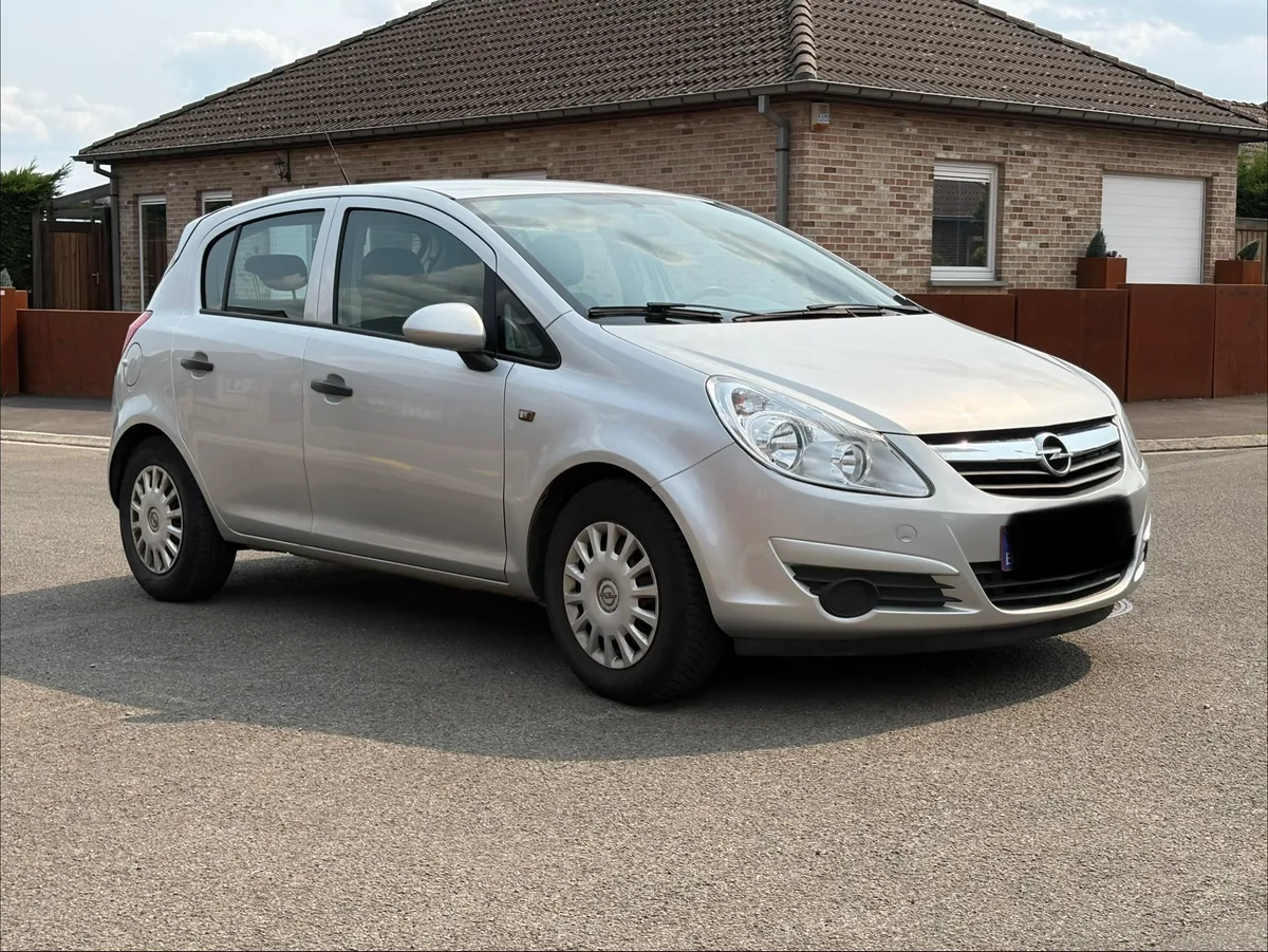 Opel Corsa 2010 — photo 4