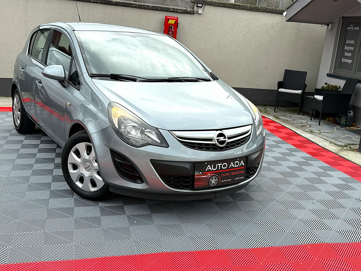 Opel Corsa 2014 — photo 1