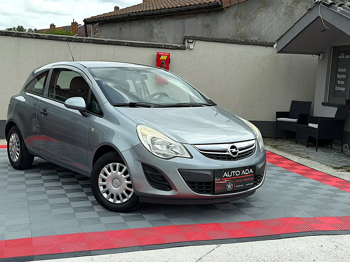 Opel Corsa 2011 — photo 1