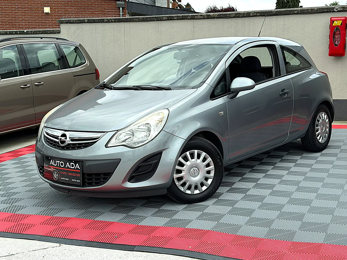 Opel Corsa 2011 — photo 2