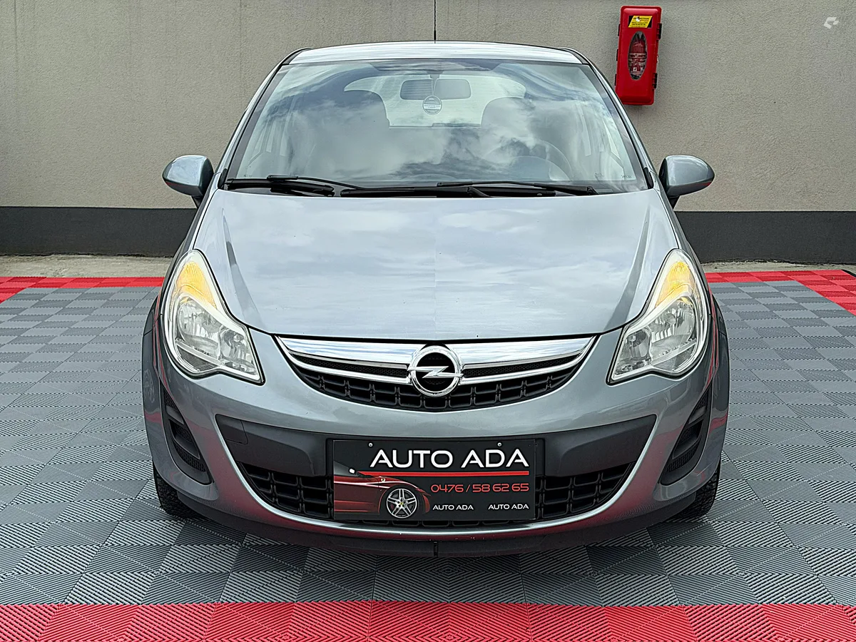 Opel Corsa 2011 — photo 3