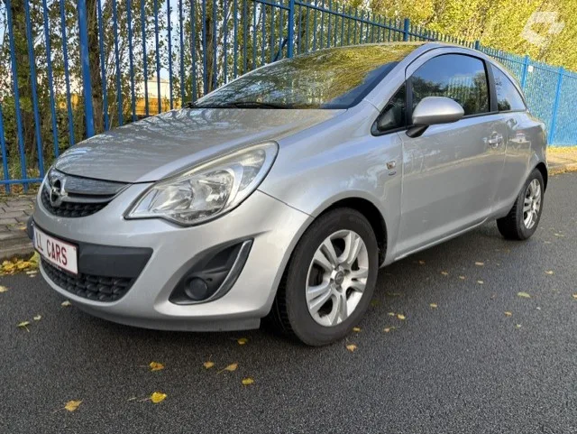 Opel Corsa 2011 — photo 1