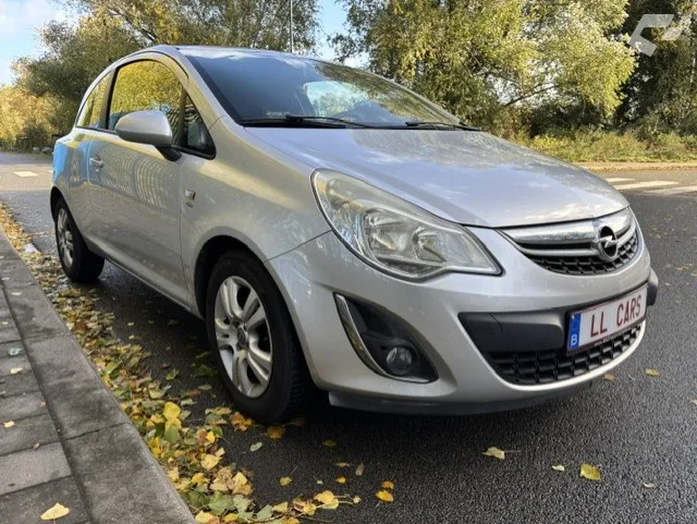 Opel Corsa 2011 — photo 2