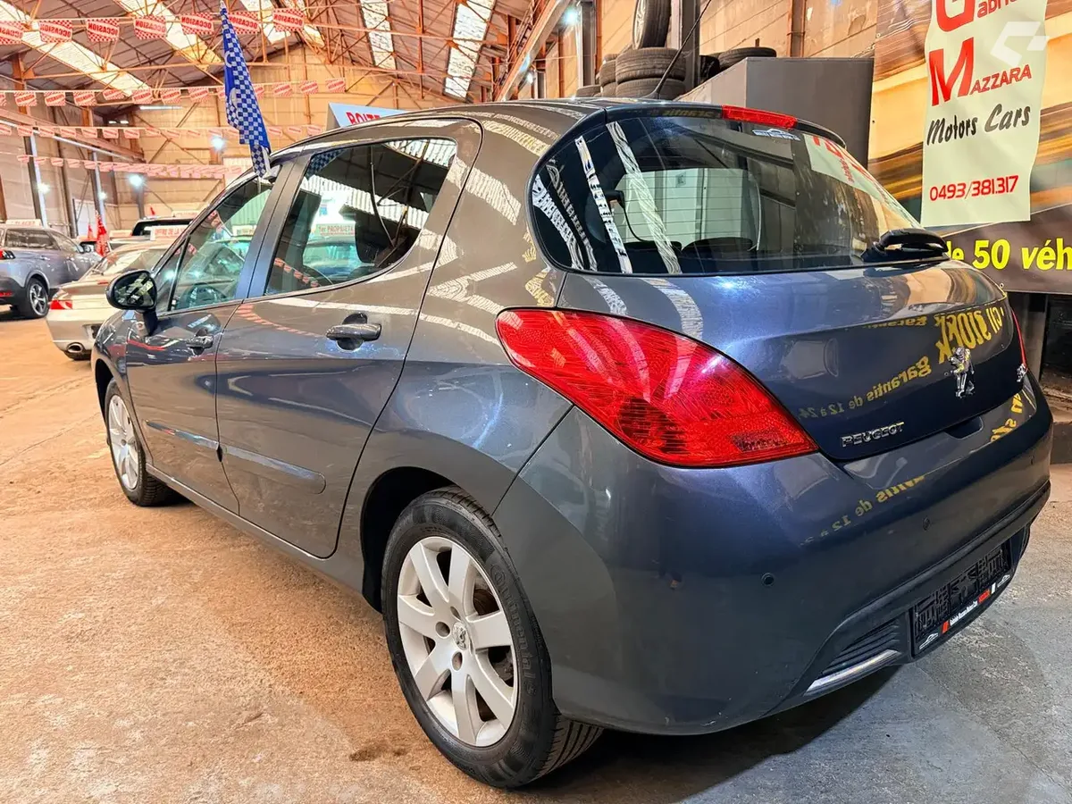 Peugeot 308 2011 — photo 4