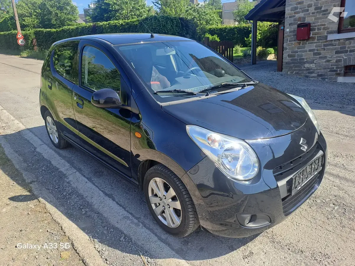 Suzuki Alto 2009 — photo 1
