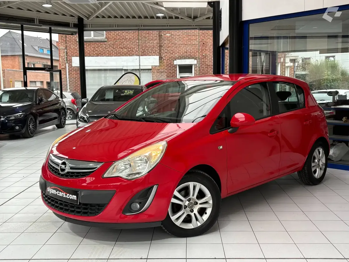 Opel Corsa 2013 — photo 1