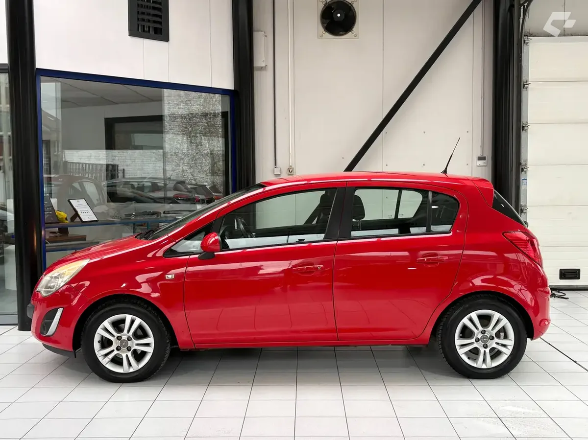Opel Corsa 2013 — photo 2