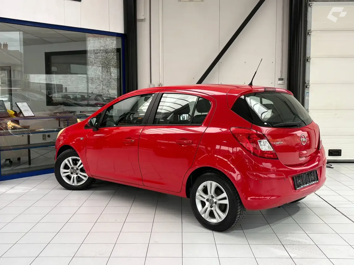 Opel Corsa 2013 — photo 3