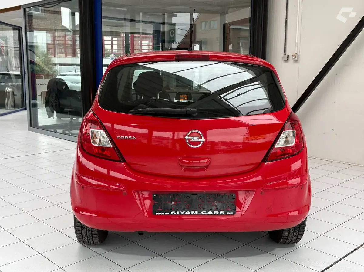 Opel Corsa 2013 — photo 4