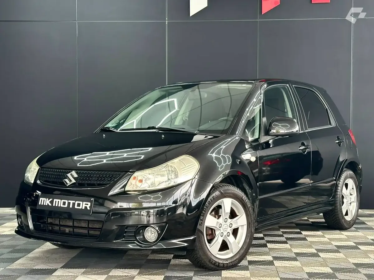 Suzuki SX4 2011 — photo 1