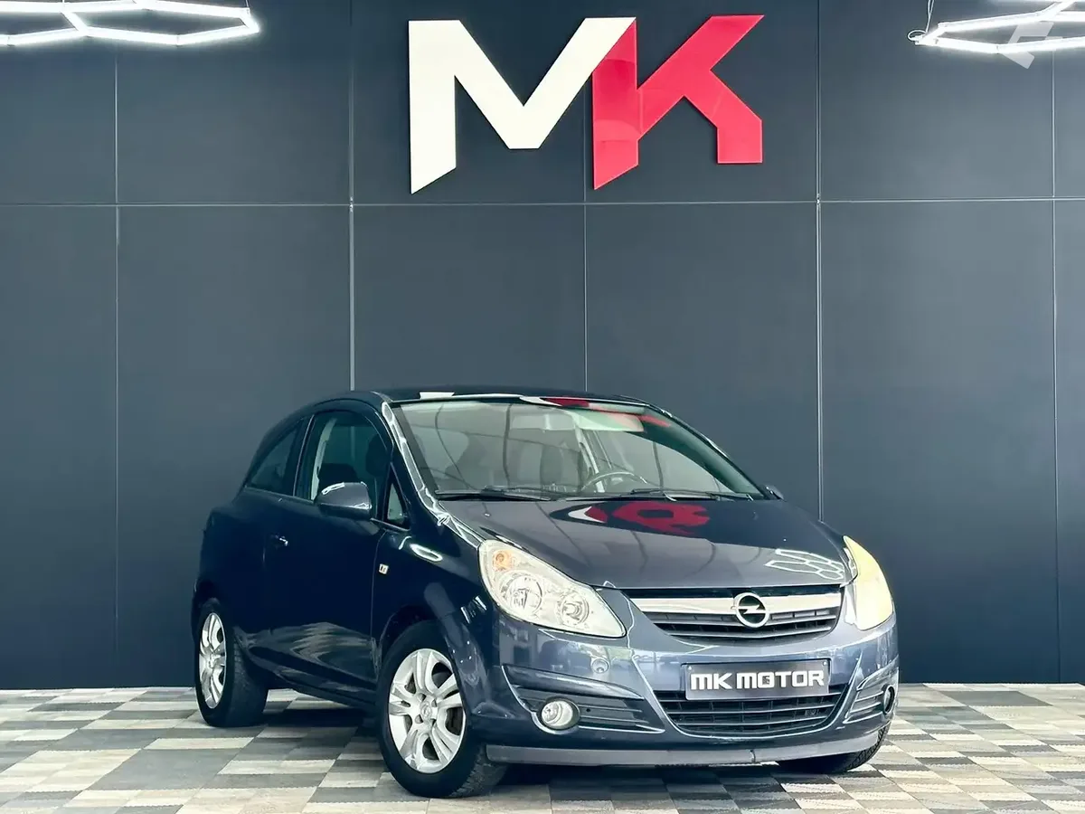 Opel Corsa 2010 — photo 1